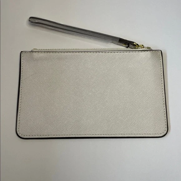 NWT Kate Spade cream saffiano wristlet with gold logo.  8x5” - Picture 3 of 7